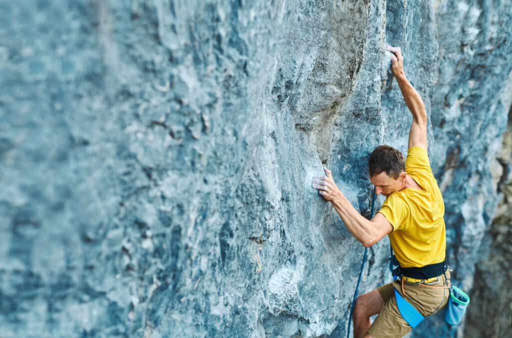 Rock climber sending a route