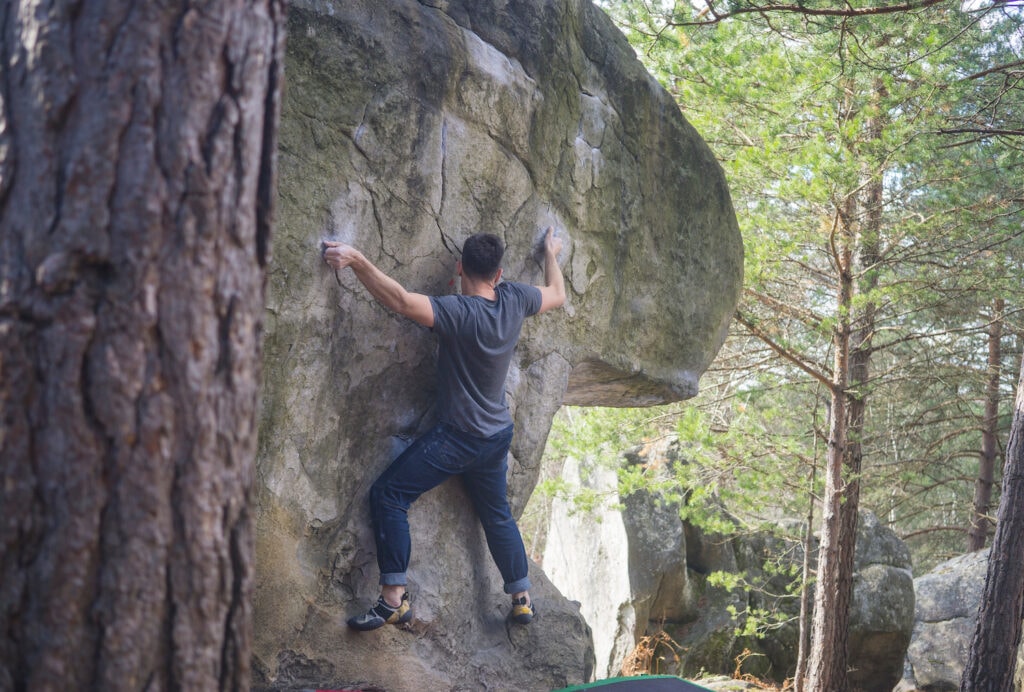rock climber on boulder