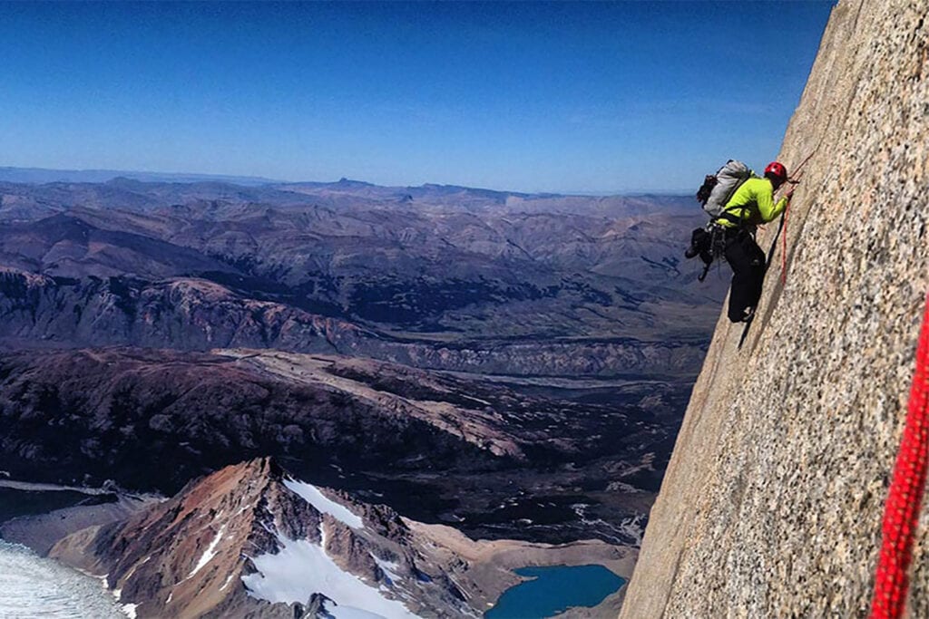 Tommy Caldwell climbing cliff