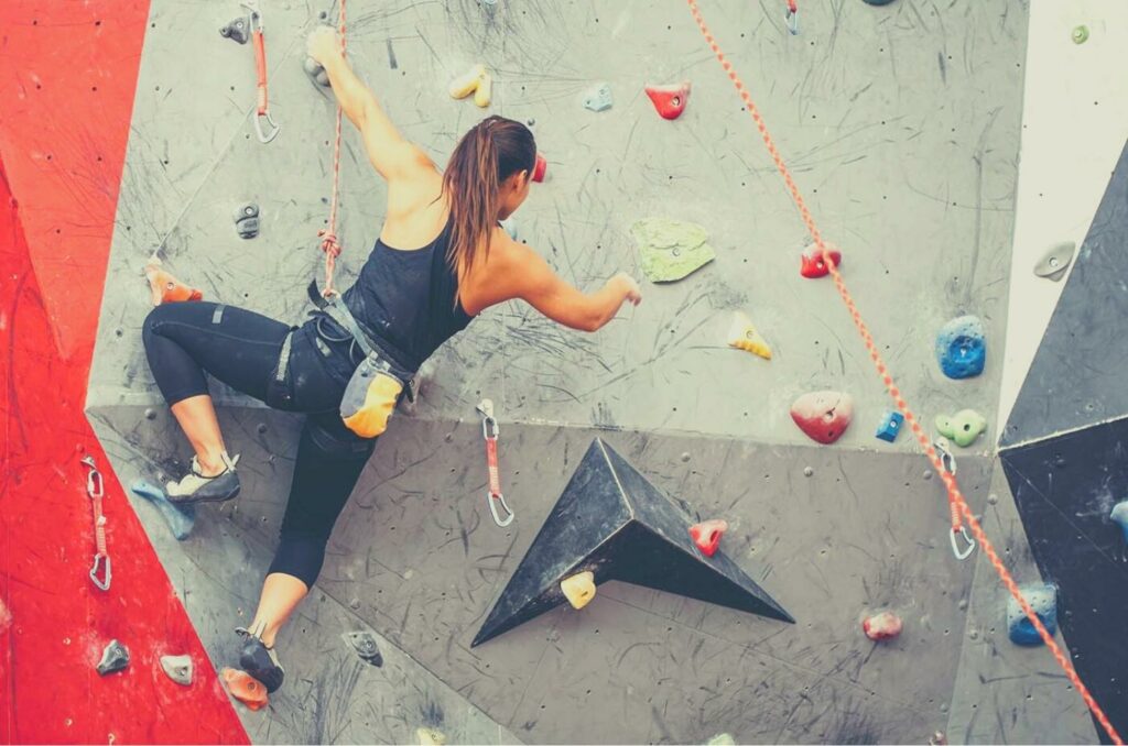 climb alone in a gym with a chalk bag