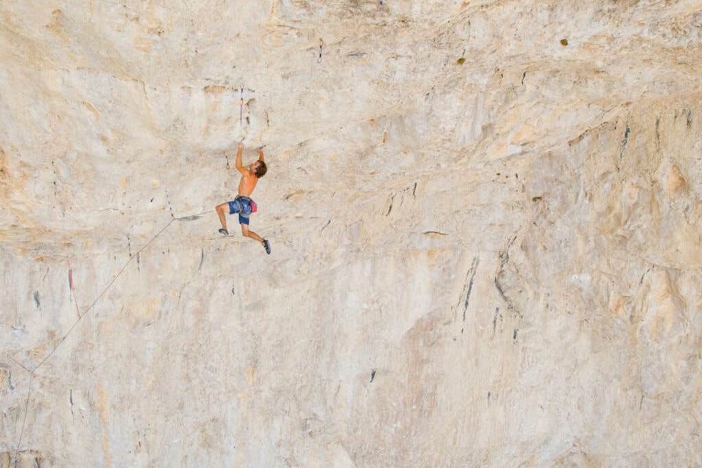 Chris Sharma completes the world's hardest rock cimb! At 250 feet, it's one of the longest single pitches in the world. 