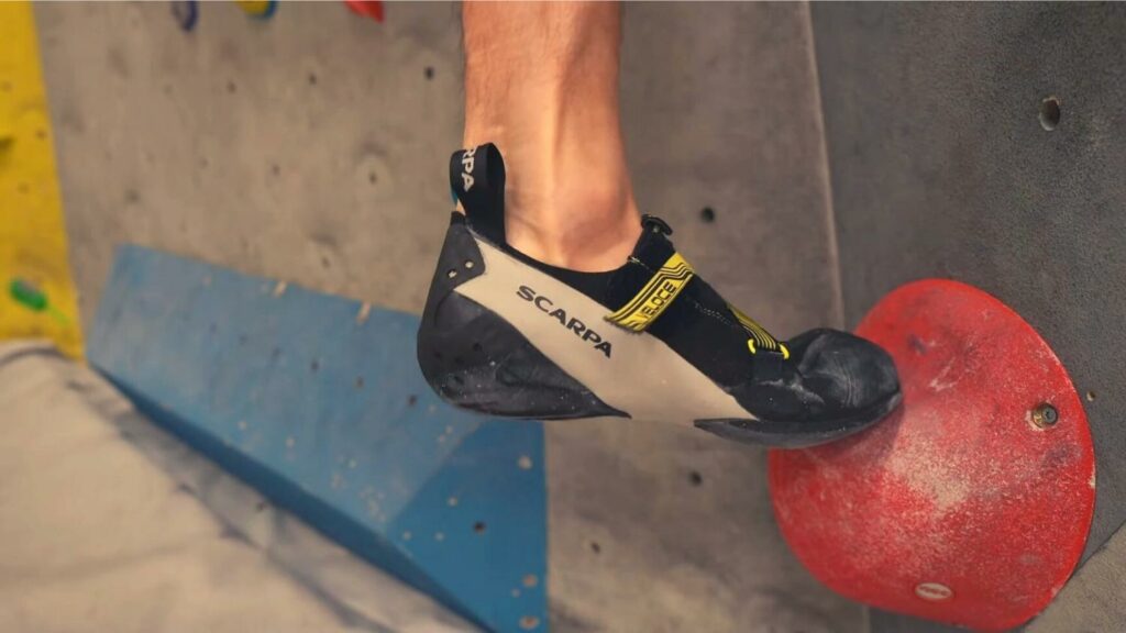 Scarpa Veloce on jug in climbing gym
