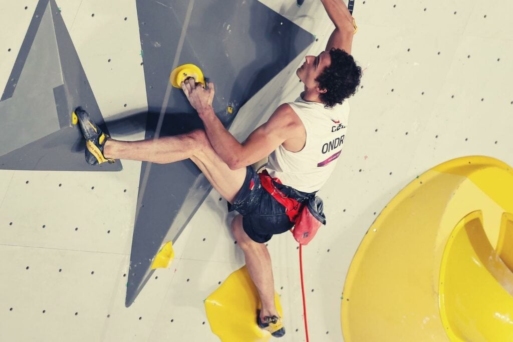 Adam Ondra speed climbed at the Olympics in 2021 on an artificial climbing wall