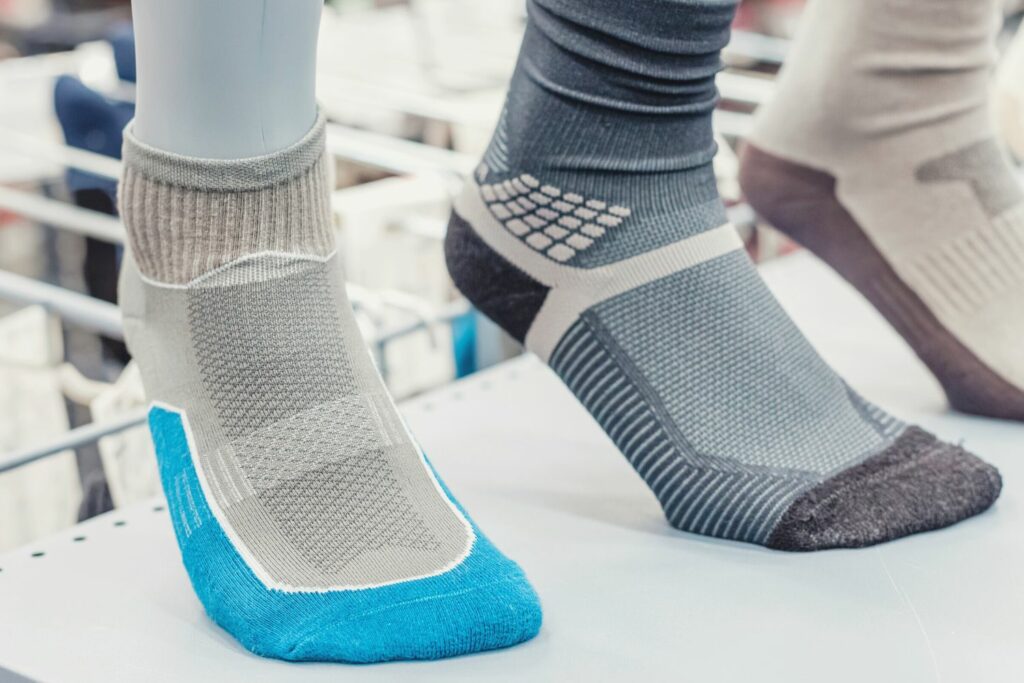 Engineered socks on feet