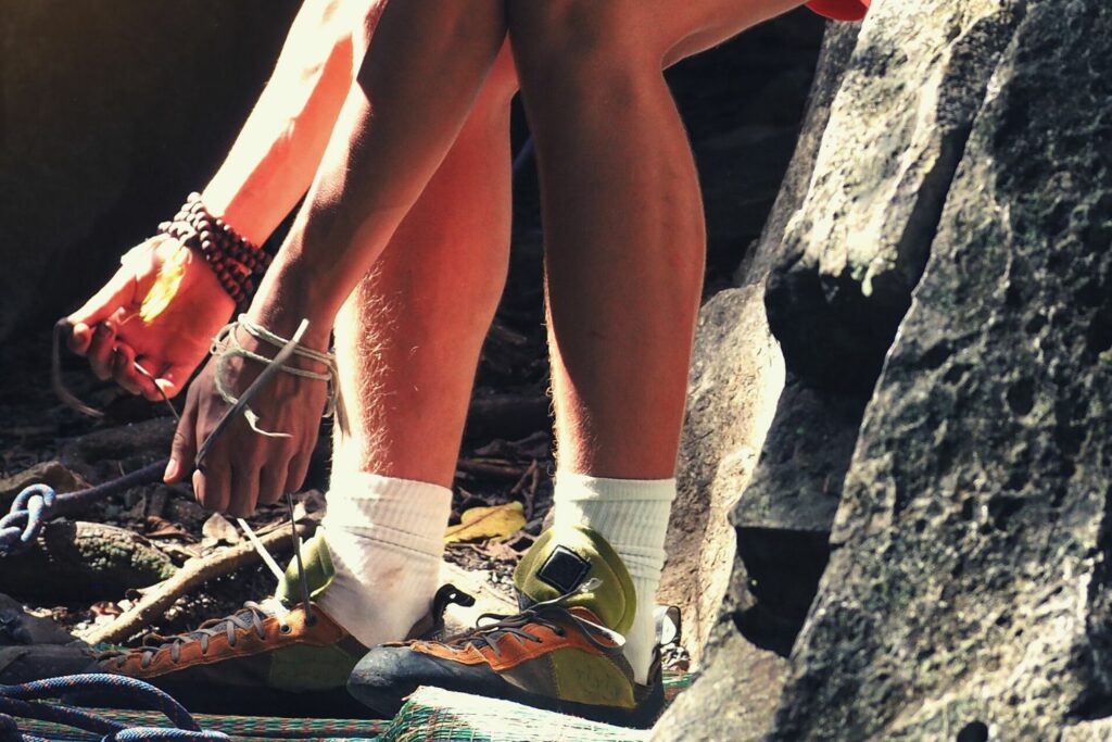 climber wearing socks with specialized climbing shoes