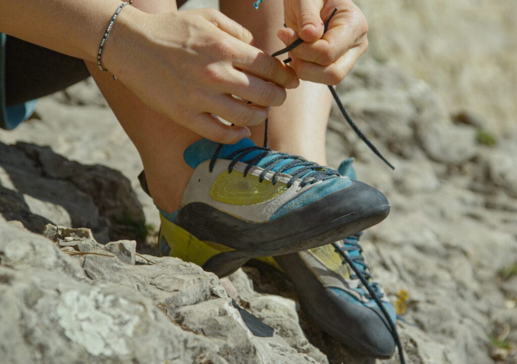 climbing shoes for beginners fastened with a lacing system