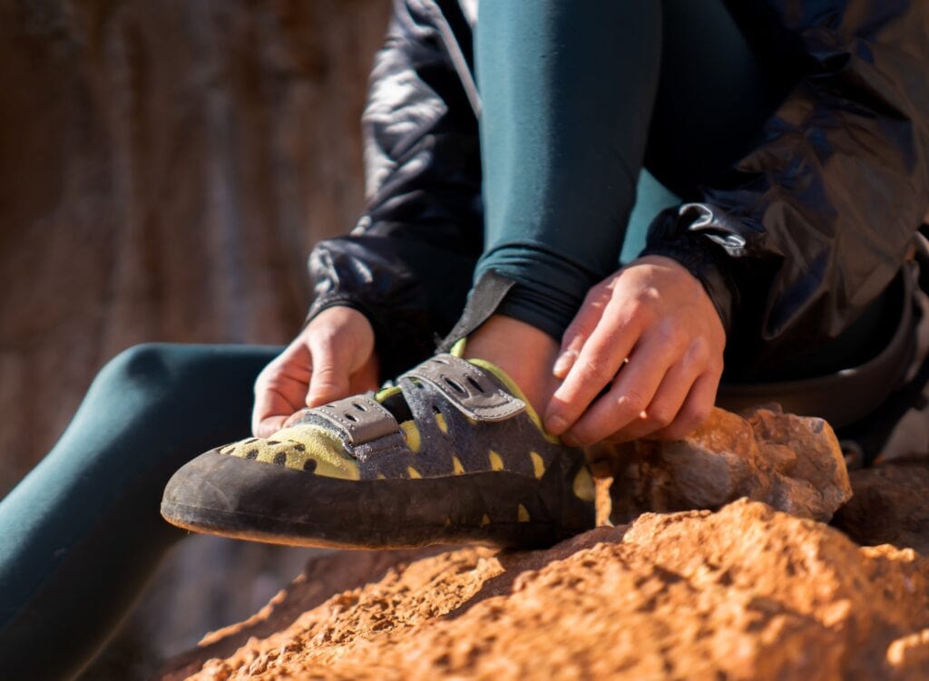 beginner climber slipping in la sportiva katana shoes for rock climbing session