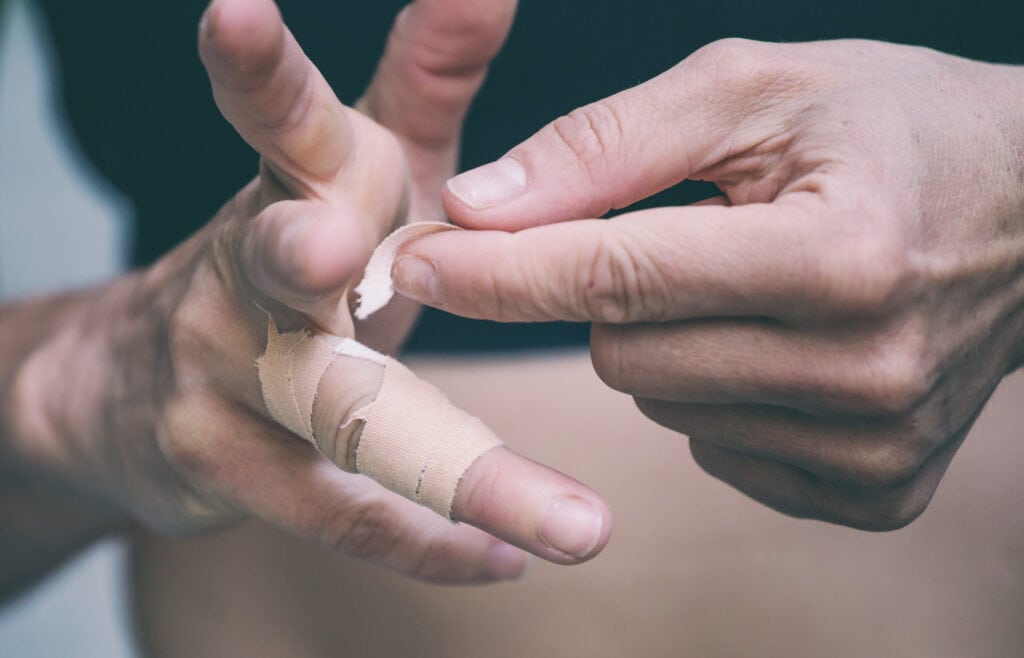 climber taping fingers