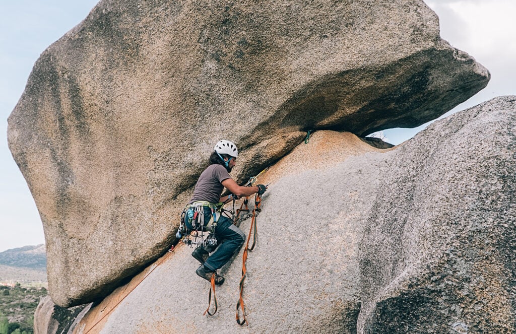 man climbing rock formation with la sportiva tc pro climbing shoe