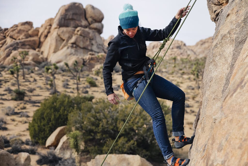 climber wearing jeans outdoors