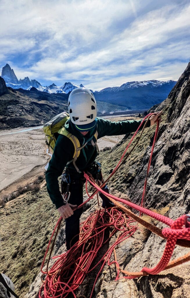Trad climber managing ropes