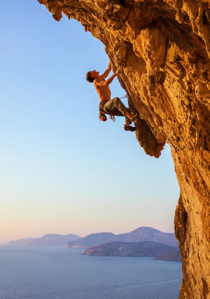 climber leading a route in Kalymnos, Greece