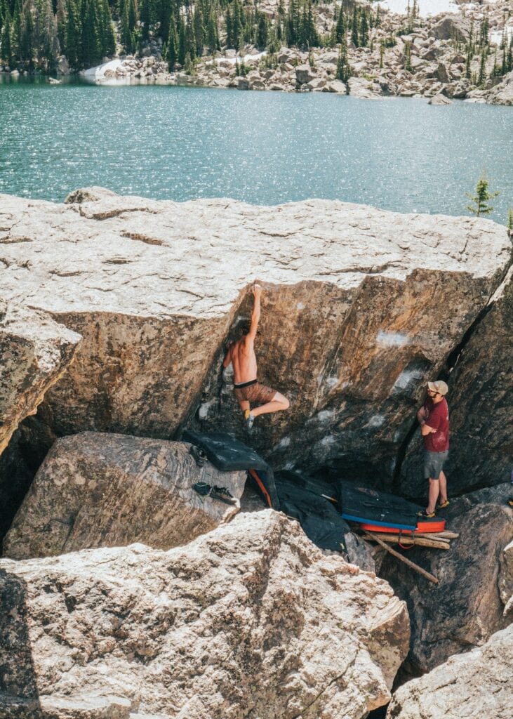 climbers sending a boulder outdoor