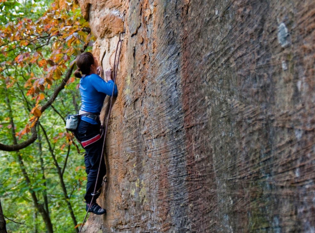 woman free climbing at Red River (not to be confused with new river gorge, west virginia)