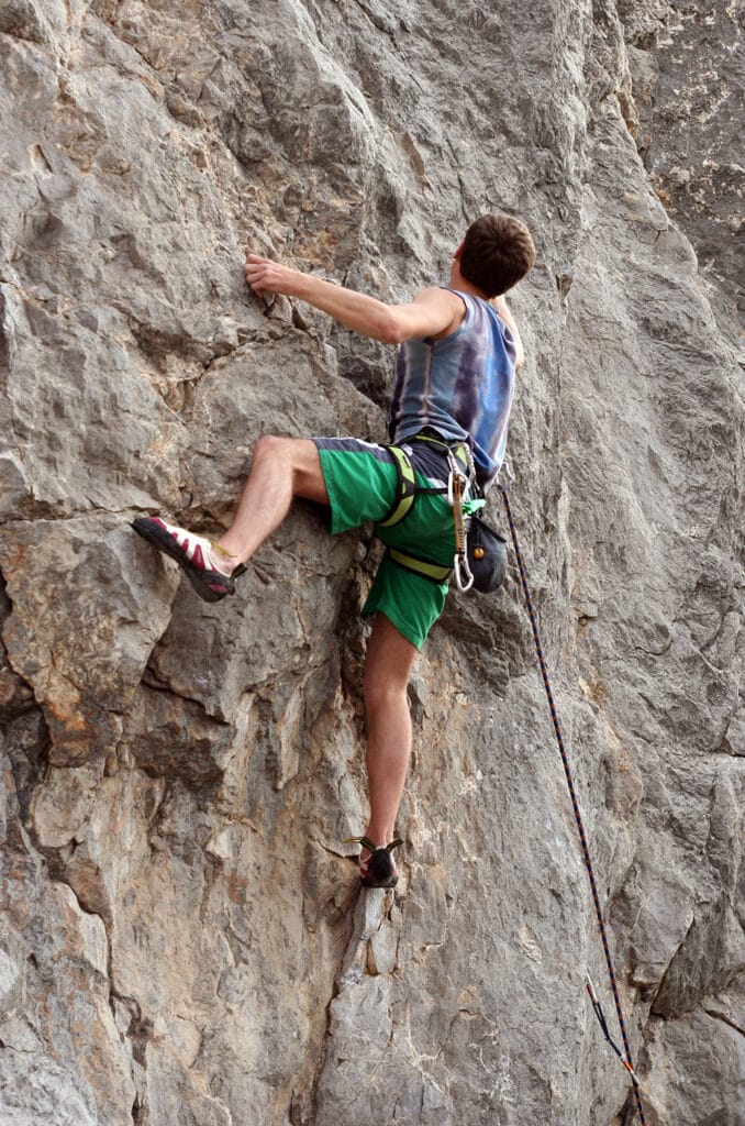 man rock climbing in Colorado
