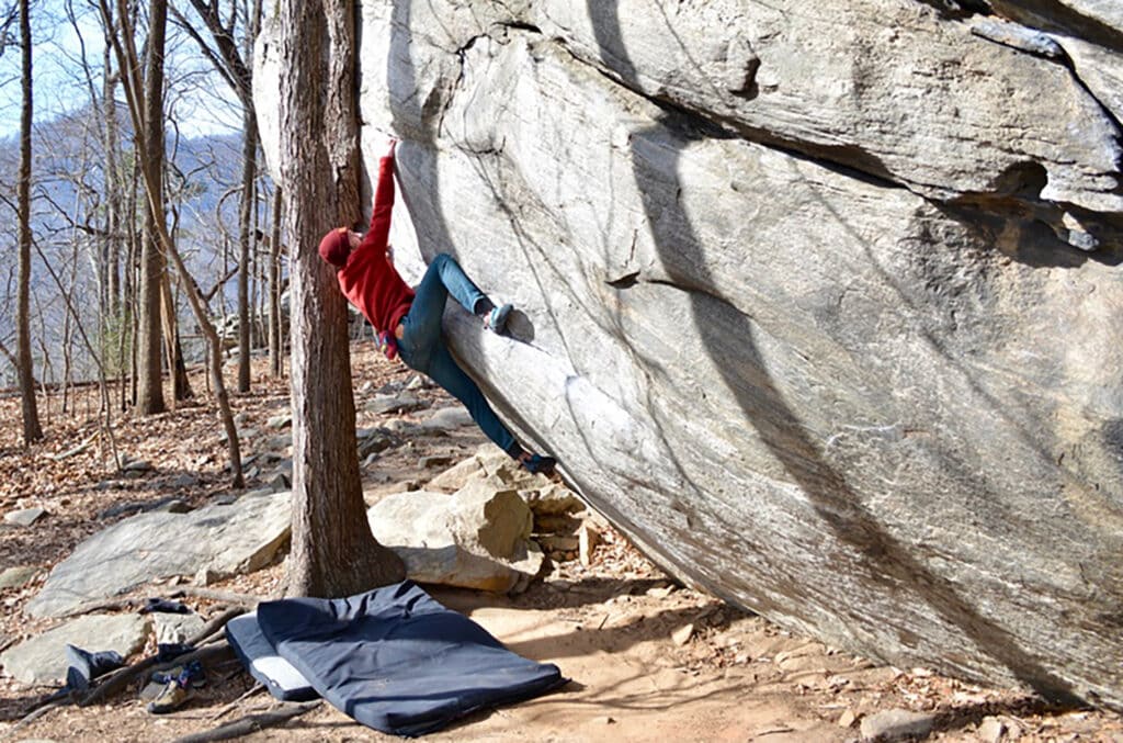 man bouldering on Dime Crack route in Rumbling bald