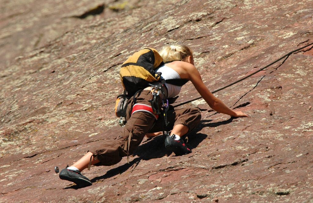 Rock Climber Stretches for a Hold on the Colorado Flatirons