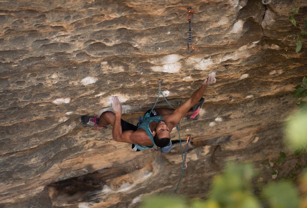 Kai Lightner climbing in outdoor spaces