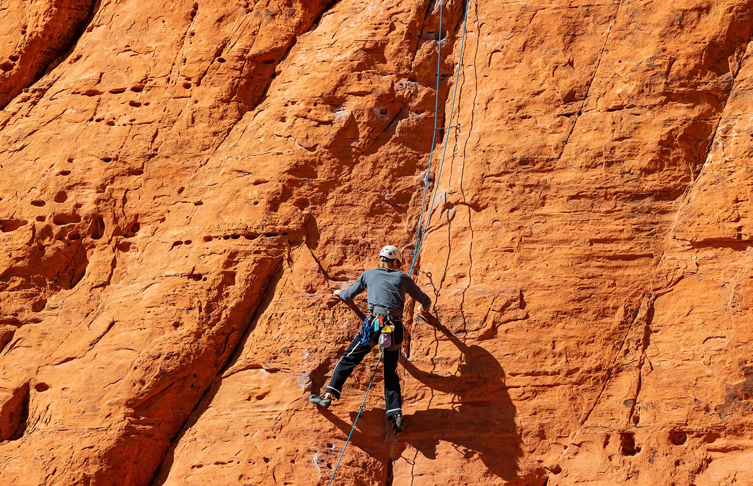 man rock climbing in Red Rock Canyon, Nevada, USA