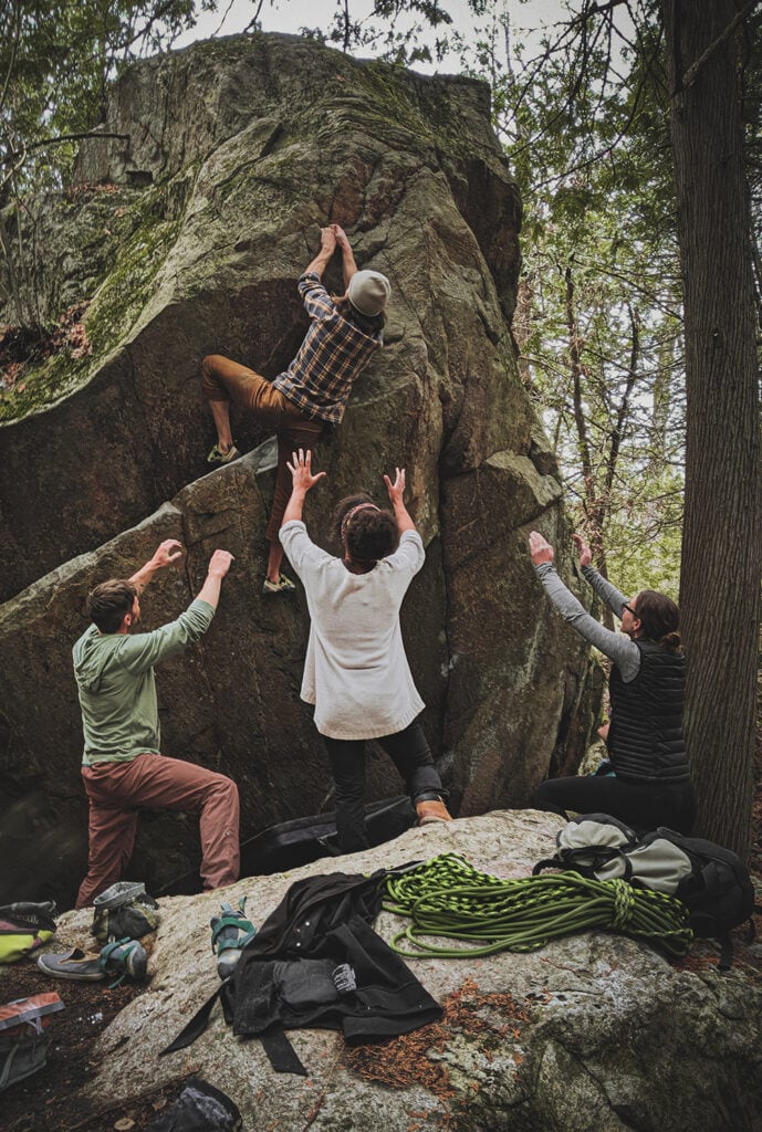 group of friends bouldering 