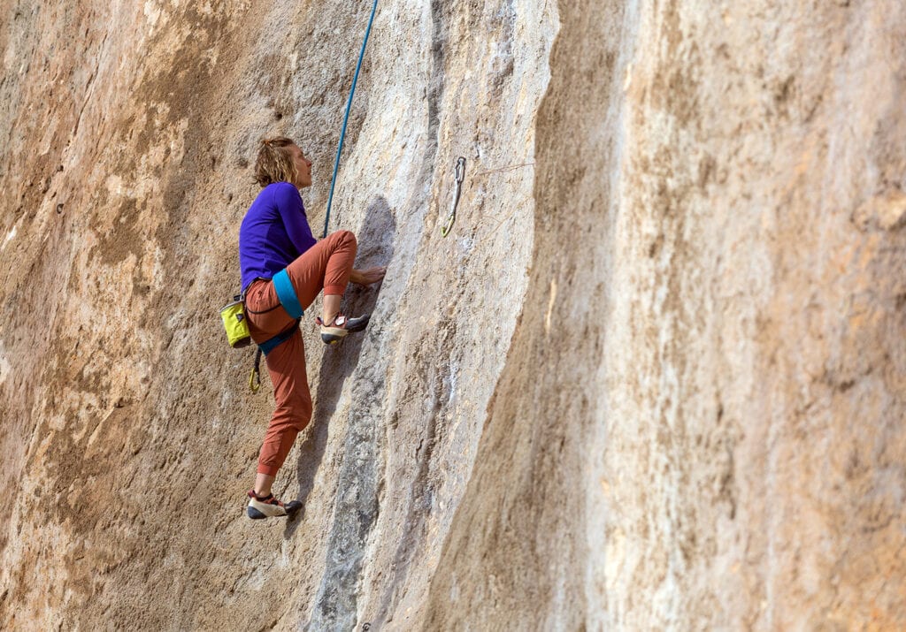 sport climber on an outdoor route in the united states