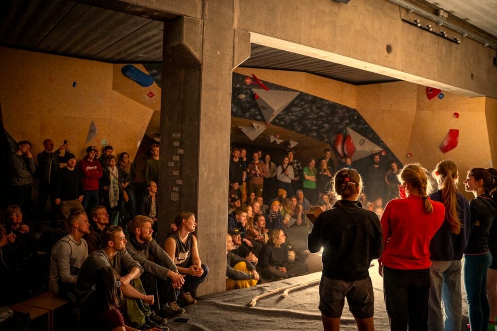bouldering event where climbers test climbing shoes