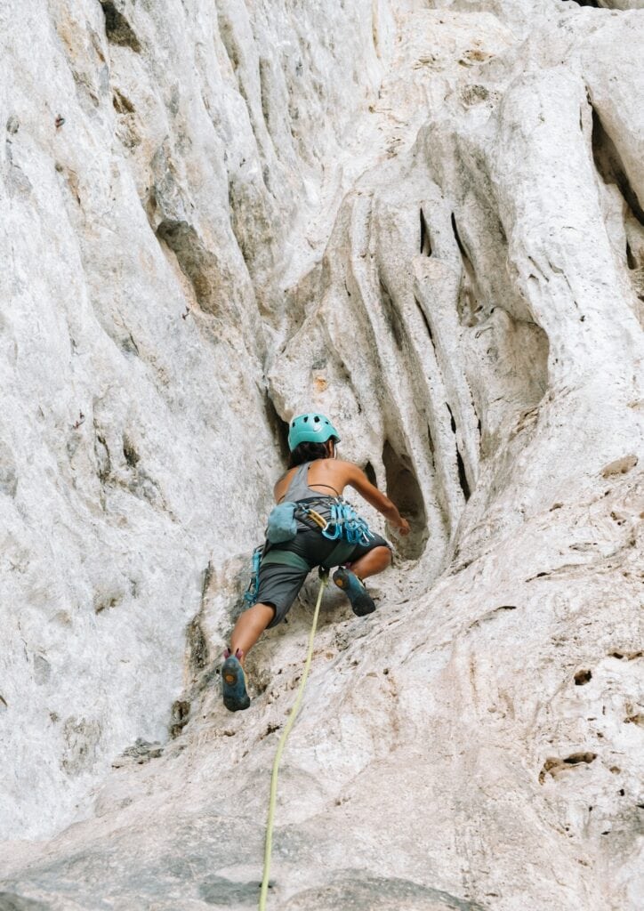 climber trying one of the sport routes at a crag in Europe