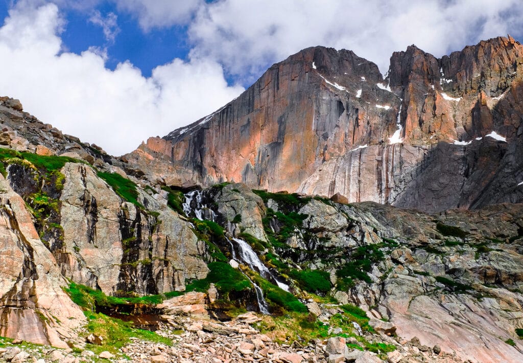 Colorado's The Diamond Face of Longs Peak and Waterfall. Rocky Mountain National Park, USA