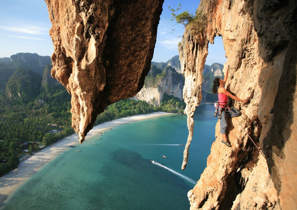 female rock climber, climbing mountain multi pitch