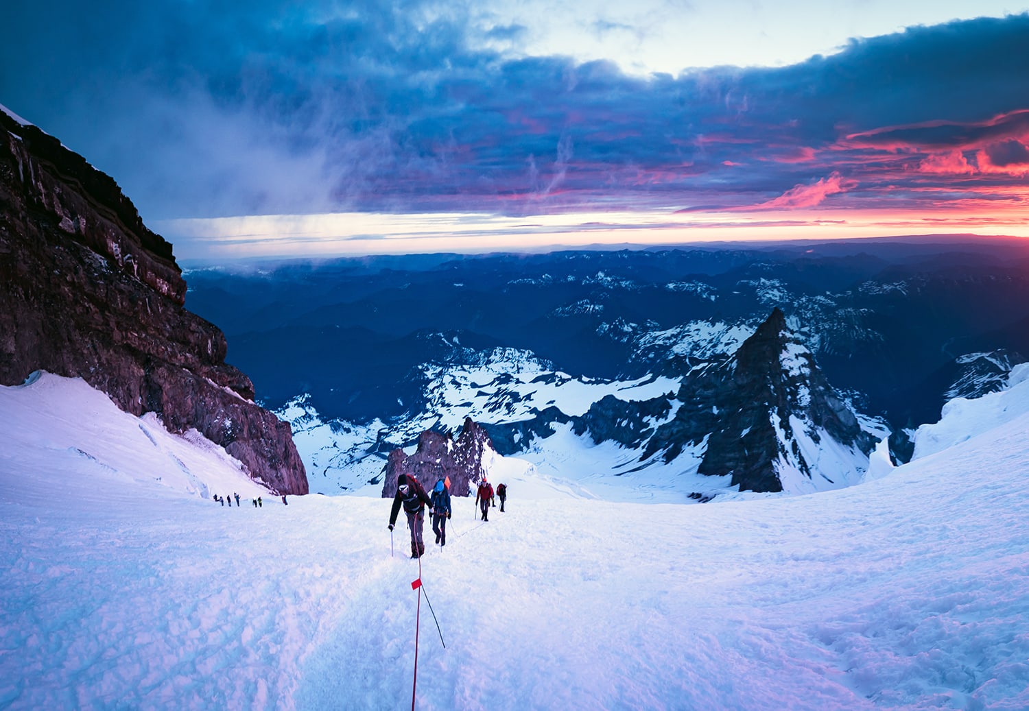 Early morning sunrise as climbers attempt to summit Mt Rainier in Washington