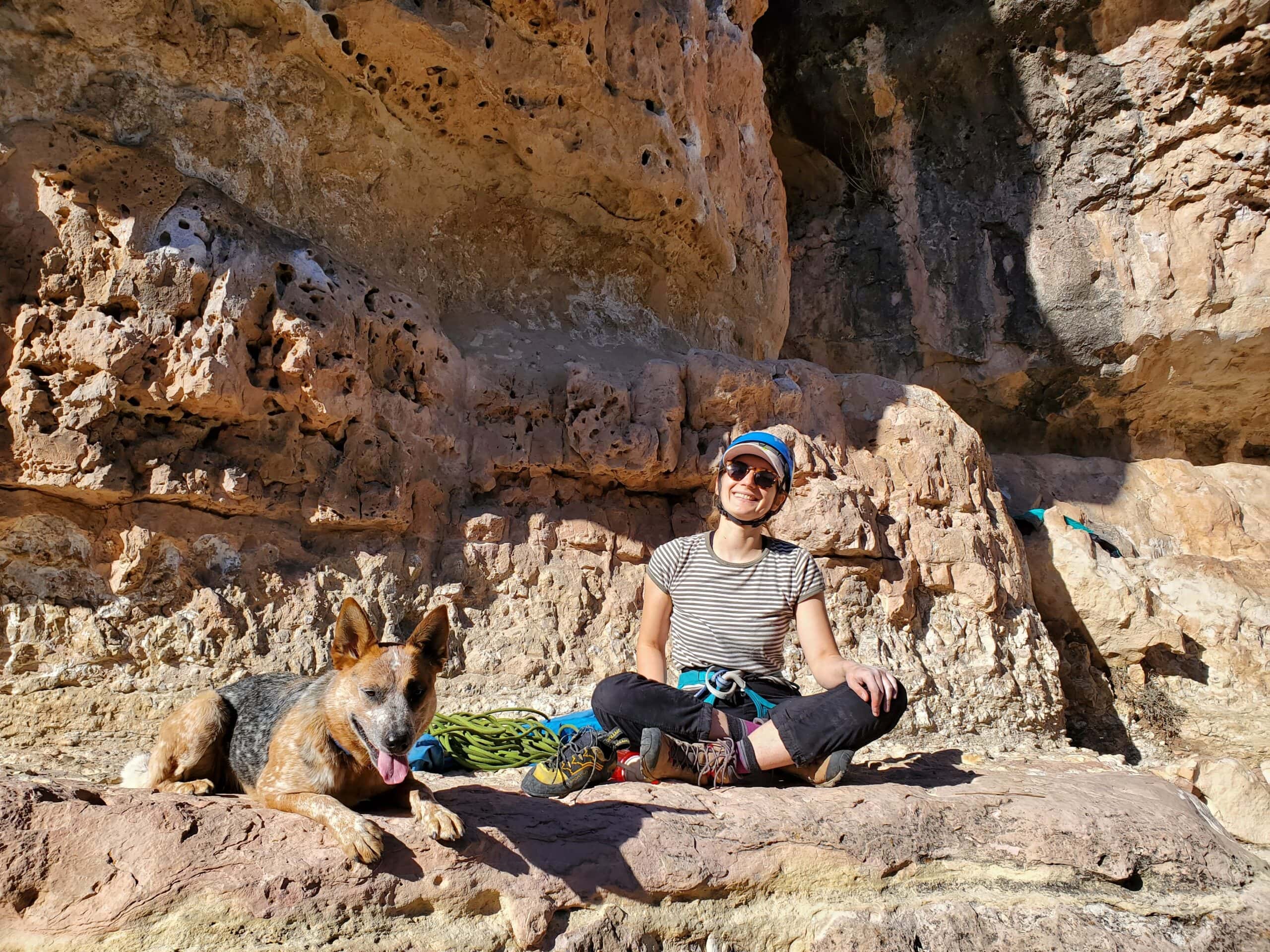 dog and human climber at the crag